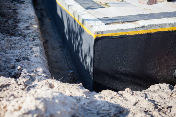 Professional Waterproofing technician working in Coltons Point, MD
